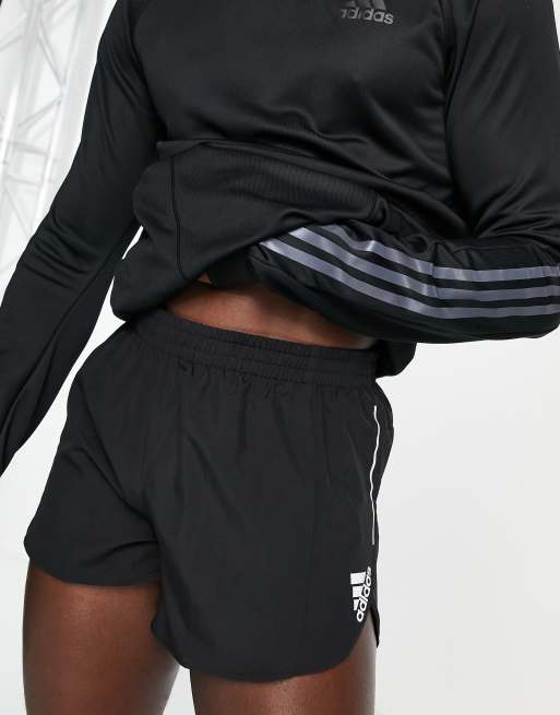 adidas Running Own The Run split short in black | ASOS