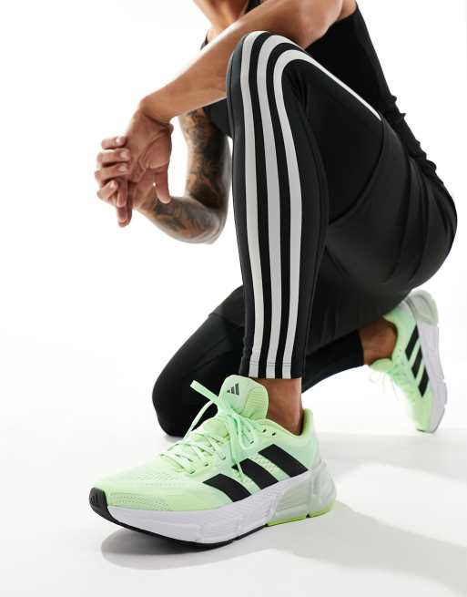 Black and store green adidas trainers