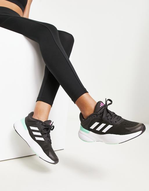 Black and green adidas sales trainers