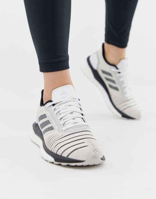 adidas Running Solar Drive Trainers In White And Black