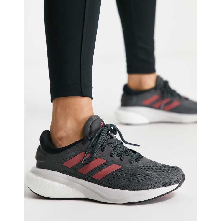 i mellemtiden bundt bliver nervøs adidas Running Supernova 2 sneakers in gray and pink | ASOS