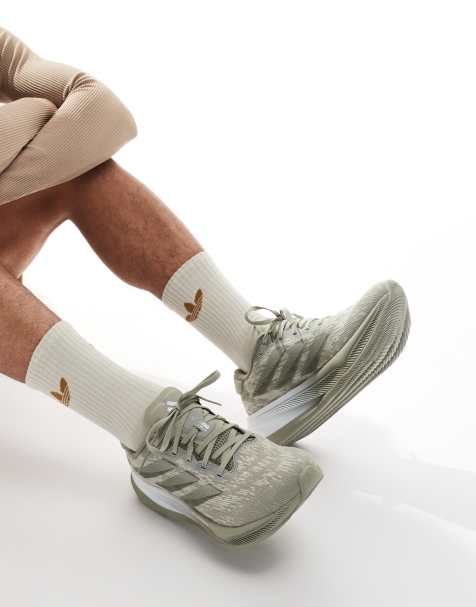 adidas – Running Supernova Comfortglide – Krämvita löparskor - view 1