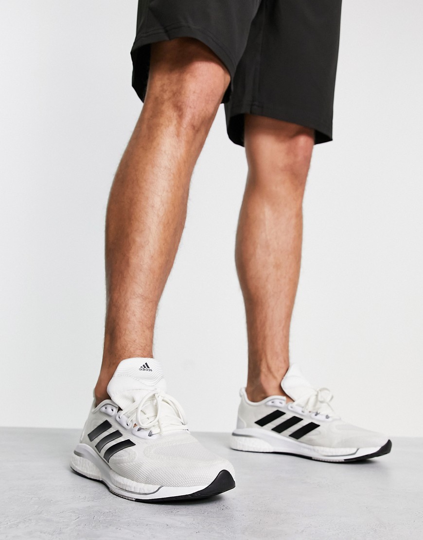 adidas Running Supernova + sneakers in white and black