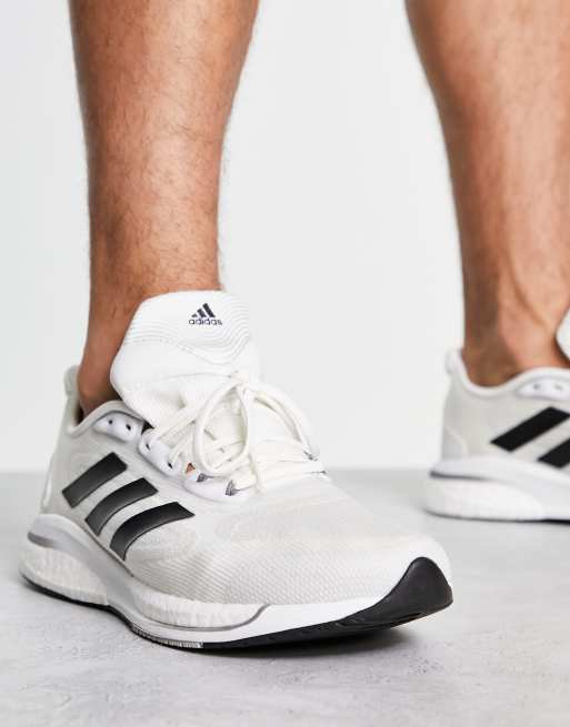 Alexander Graham Bell Acerca de la configuración Mal adidas Running Supernova + sneakers in white and black | ASOS