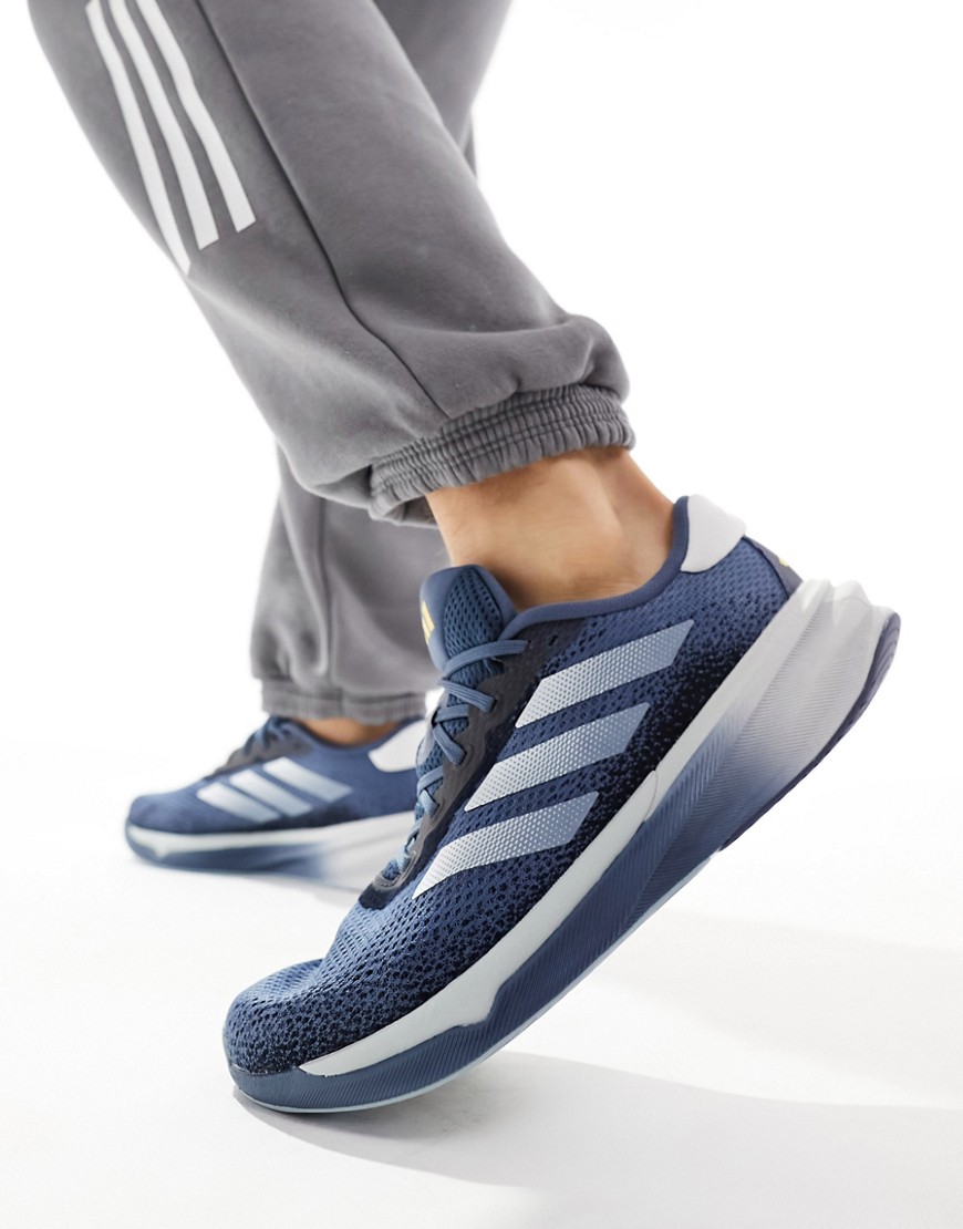adidas Running Supernova Stride trainers in navy and silver