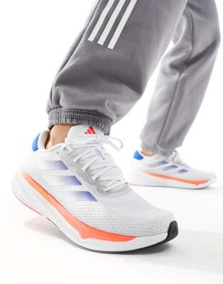 adidas performance adidas Running Supernova Stride trainers in white and blue