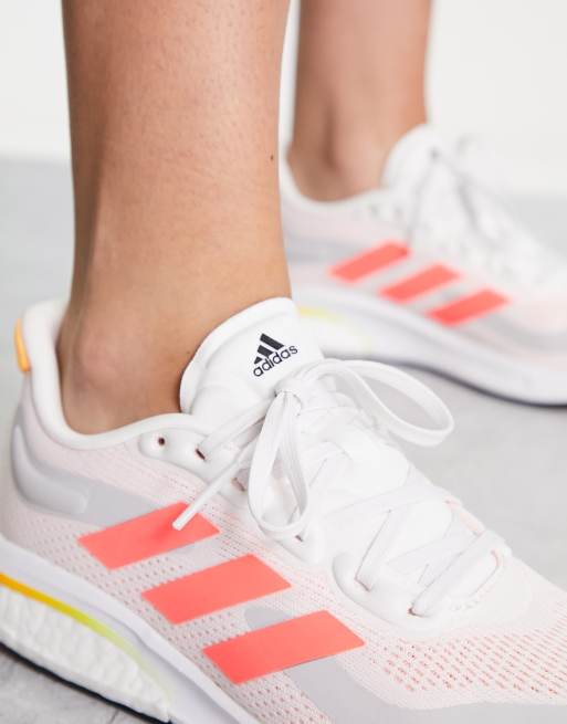 adidas Running Supernova trainers in white and pink | ASOS