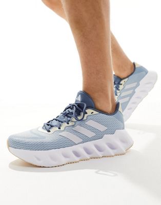 adidas Running Switch Run trainers in pale blue and white