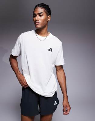 adidas Running - T-shirt avec imprimé soleil au dos - Blanc cassé