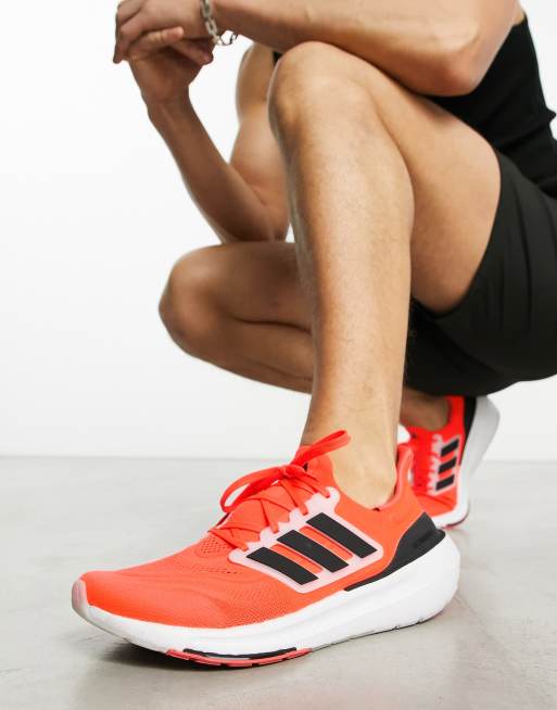 Adidas red and on sale black running shoes