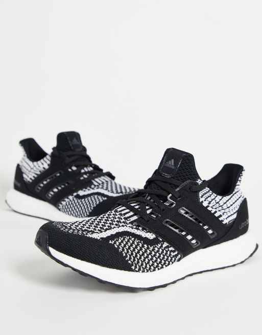 Adidas ultra boost store nere con strisce bianche