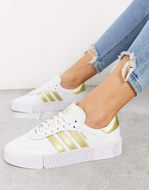 Scarpe adidas store strisce oro