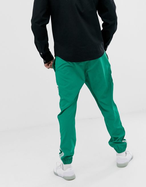 Green joggers best sale with red stripe