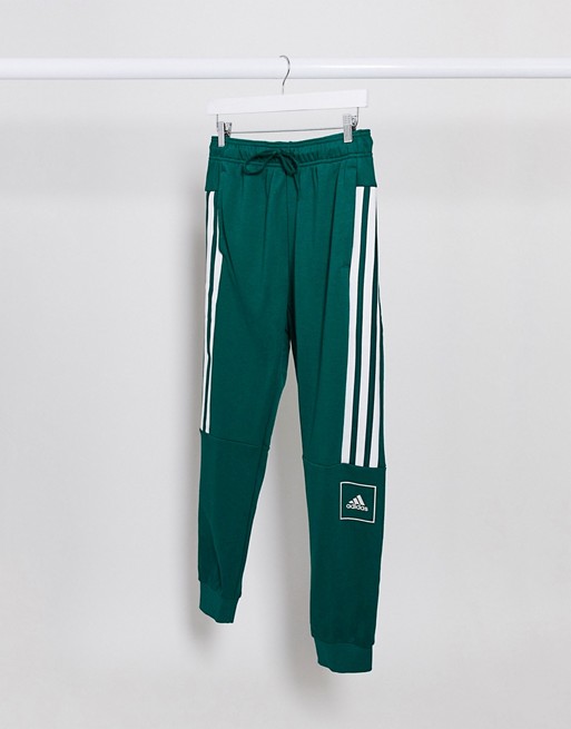 adidas Training skinny fit 3 stripe joggers in green