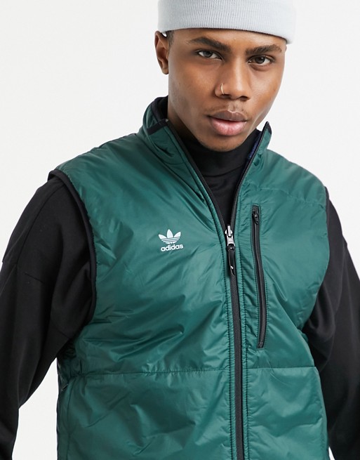 adidas Snowboarding Meade pro reversible snow vest in blue/green
