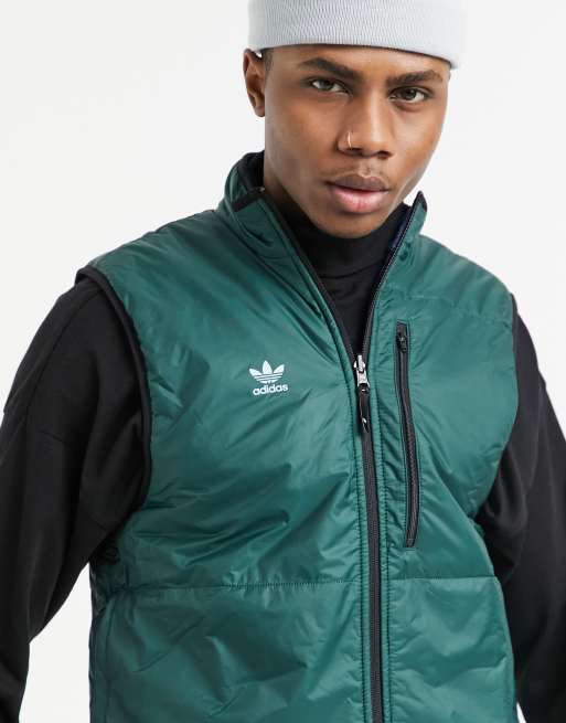 adidas Snowboarding Meade pro reversible snow vest in blue green