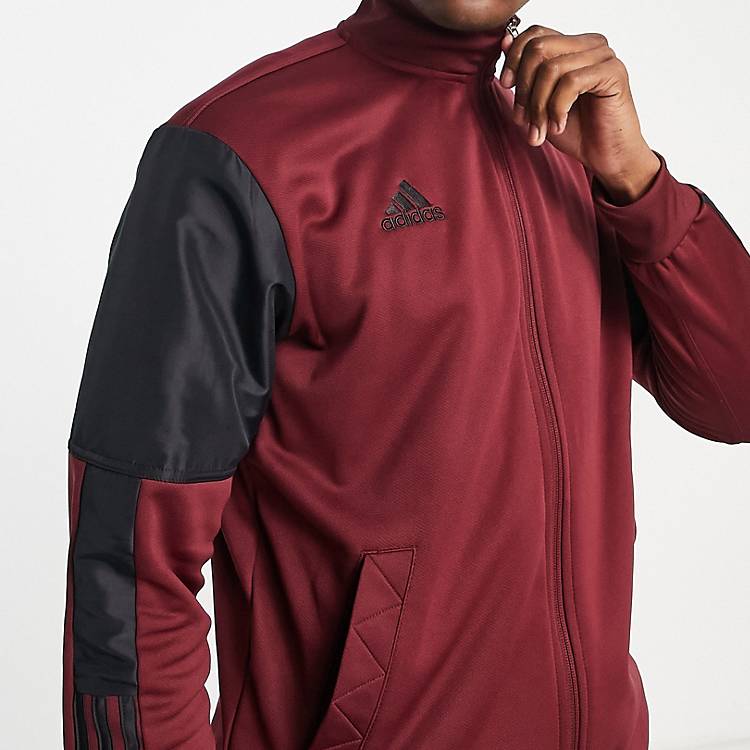 adidas Soccer Tiro paneled track jacket in burgundy | ASOS