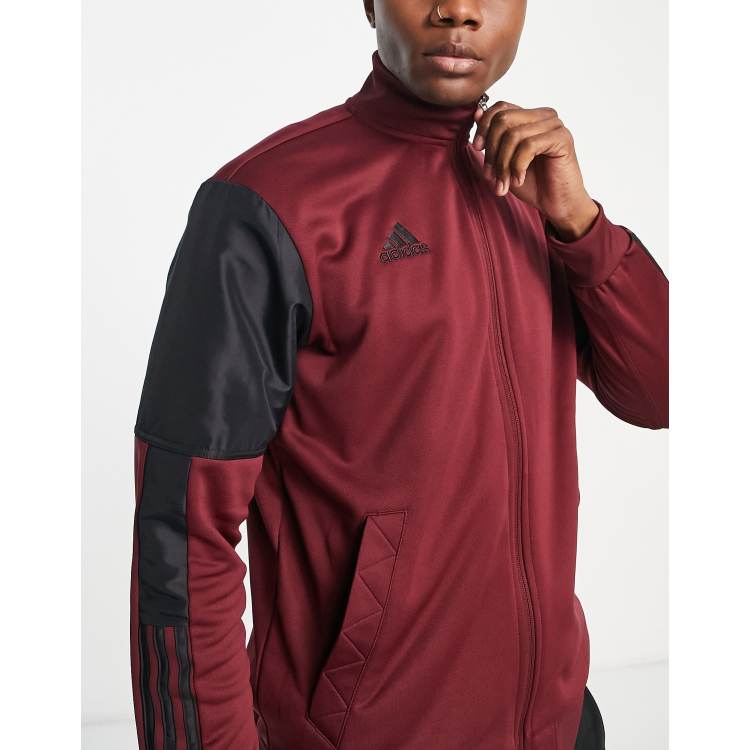 adidas Soccer Tiro paneled track jacket in burgundy