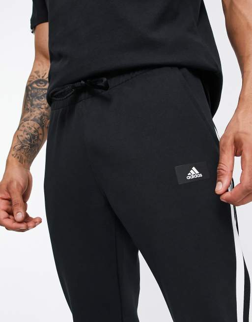 adidas Originals essentials slim fit sweatpants with small logo in