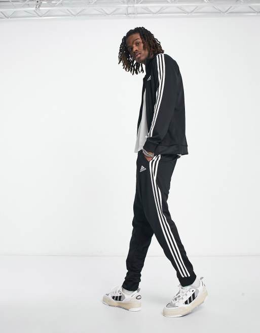 adidas Sportswear 3 stripe tracksuit in black | ASOS