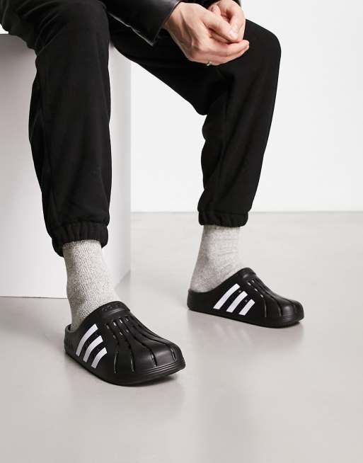 adidas Sportswear Adilette clogs in black ASOS