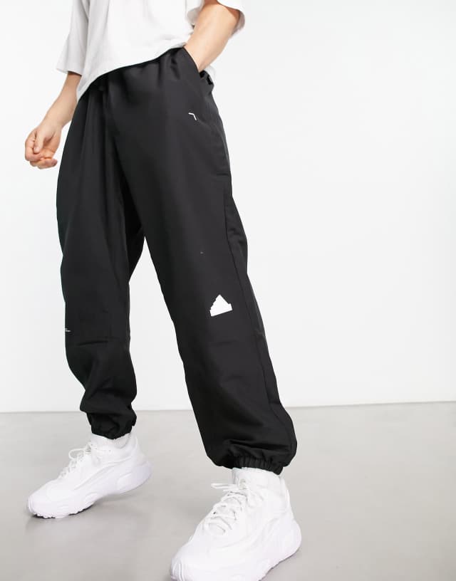 adidas Sportswear Color block sweatpants in green and navy