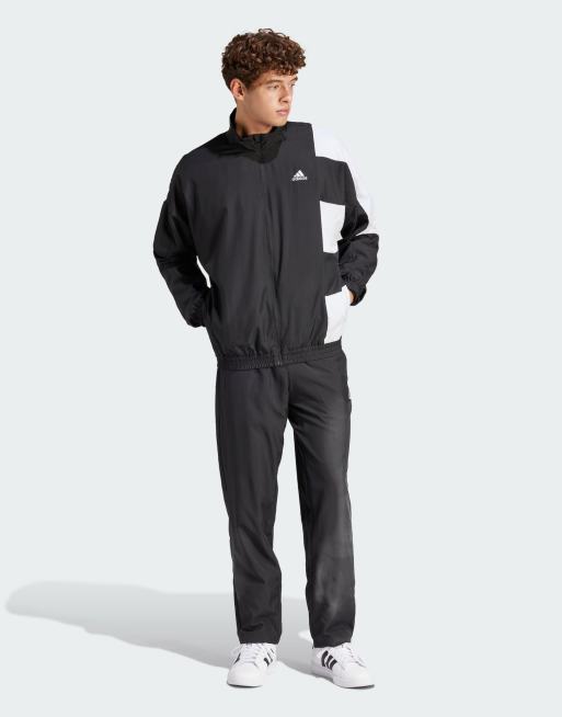 adidas Sportswear Colorblock tracksuit in black | ASOS