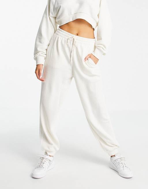 adidas Sportswear Essential oversized joggers in cream ASOS