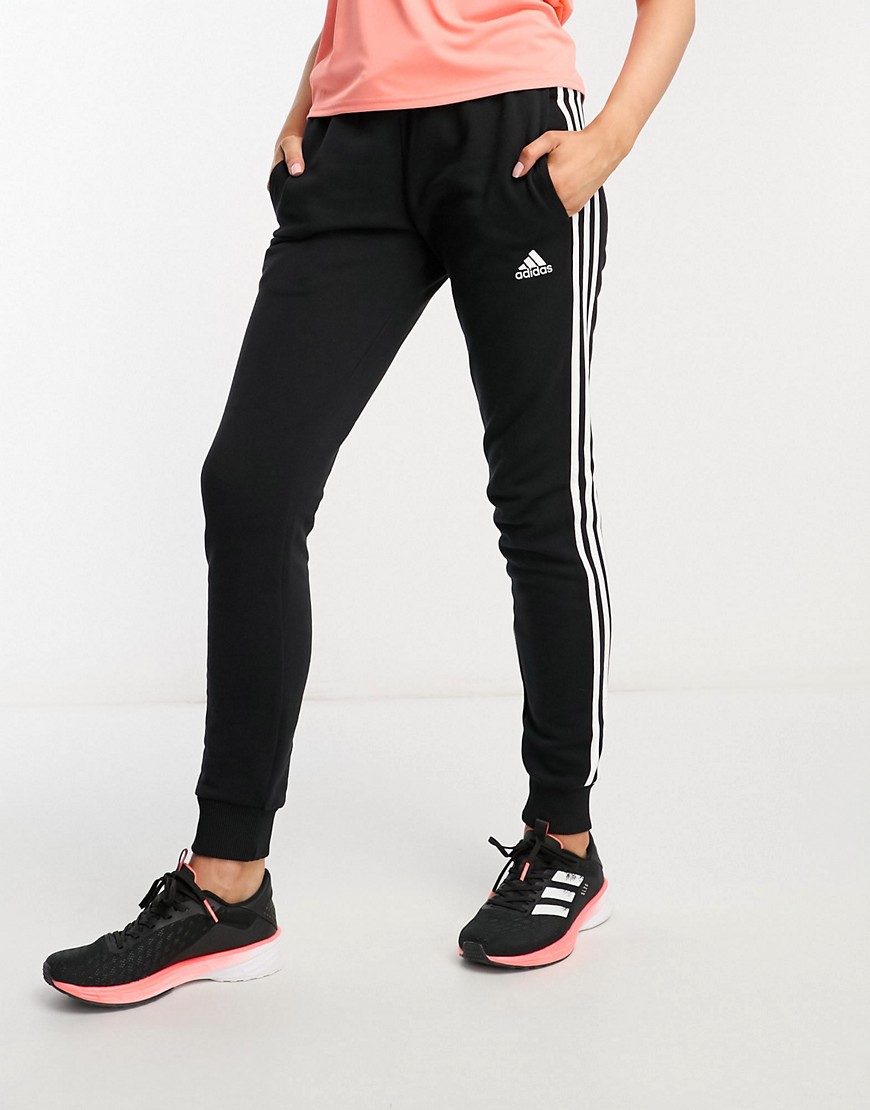 adidas Sportswear essentials 3 stripes joggers in black and white