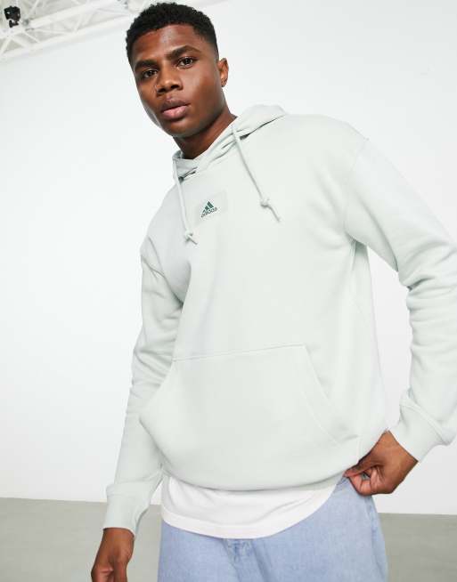 White and green adidas on sale hoodie