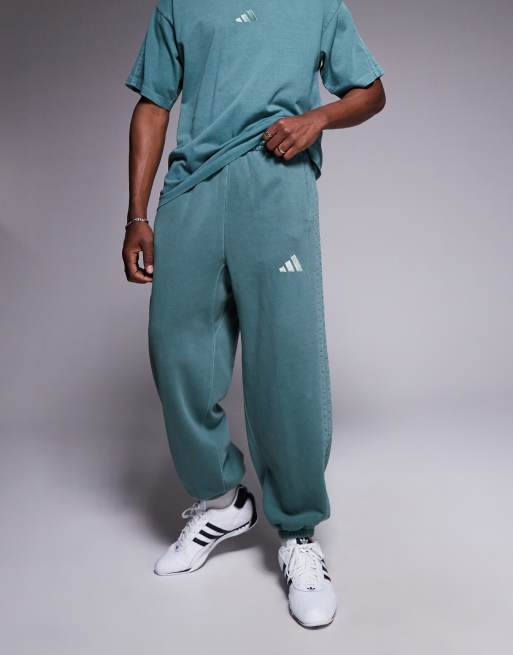 adidas Sportswear joggers in washed green ASOS