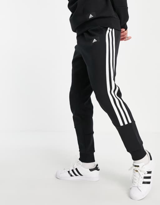 adidas Sportswear joggers with wrap three stripes in black ASOS