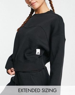 adidas Sportswear lounge sweatshirt in black - ASOS Price Checker