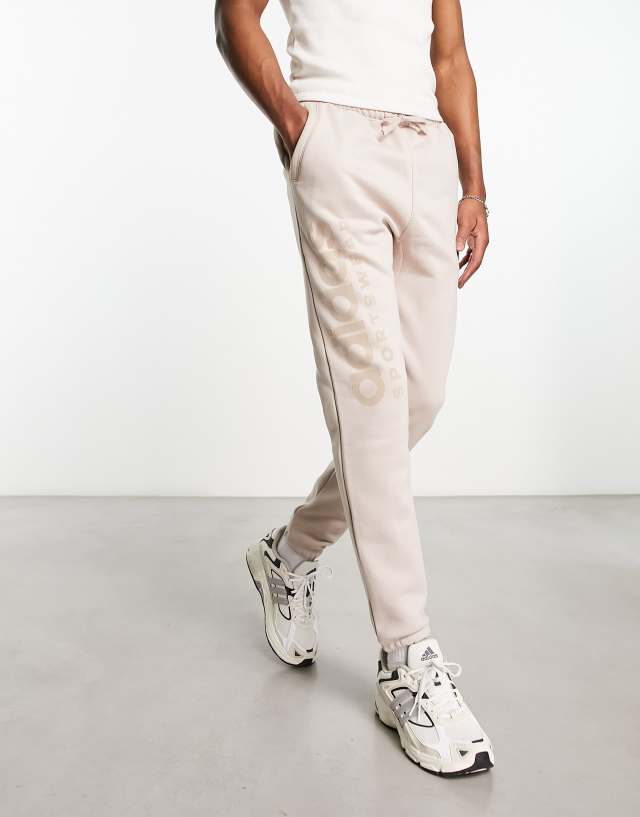 adidas Sportswear Lounge x Street sweatpants in cream