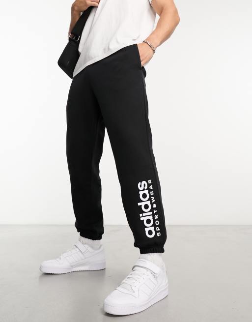 adidas Sportswear - Sorte joggingbukser med lineært logo