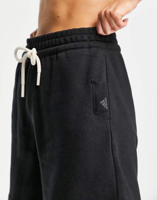 adidas Sportswear studio lounge fleece shorts in black