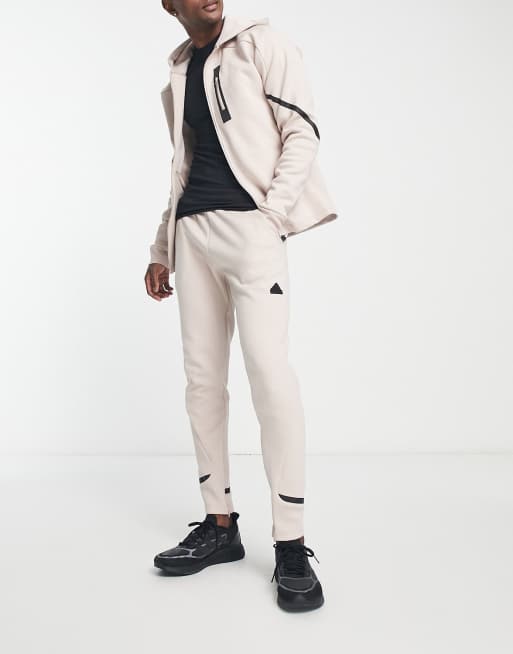 adidas Sportswear tech fleece trackies in off white ASOS