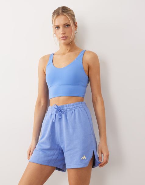 adidas – Sportswear – Three Stripes Studios – Blå och gula jersey-shorts - view 1