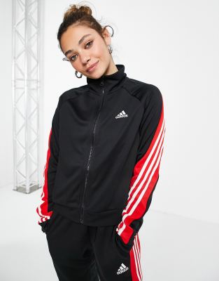 black adidas tracksuit with red stripes