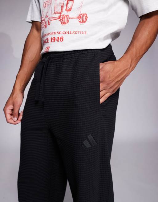 adidas - Sportswear - Trainingsbroek van wafelstof in zwart