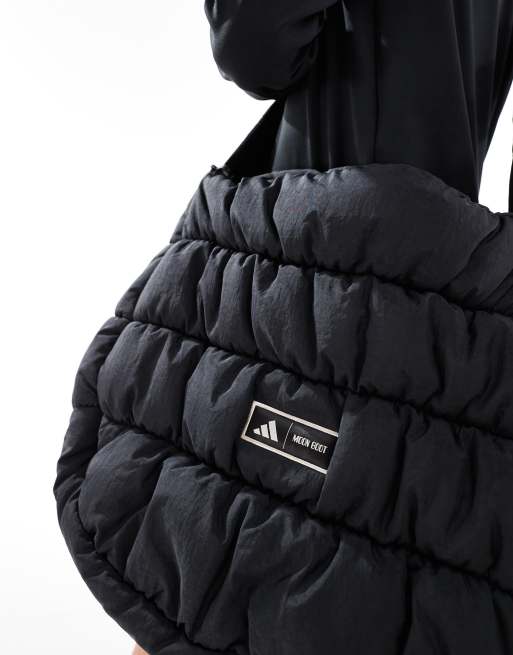 adidas Sportswear x Moon Boot quilted bag in black | ASOS