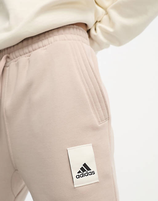 adidas Sportwear Lounge fleece joggers in brown | ASOS