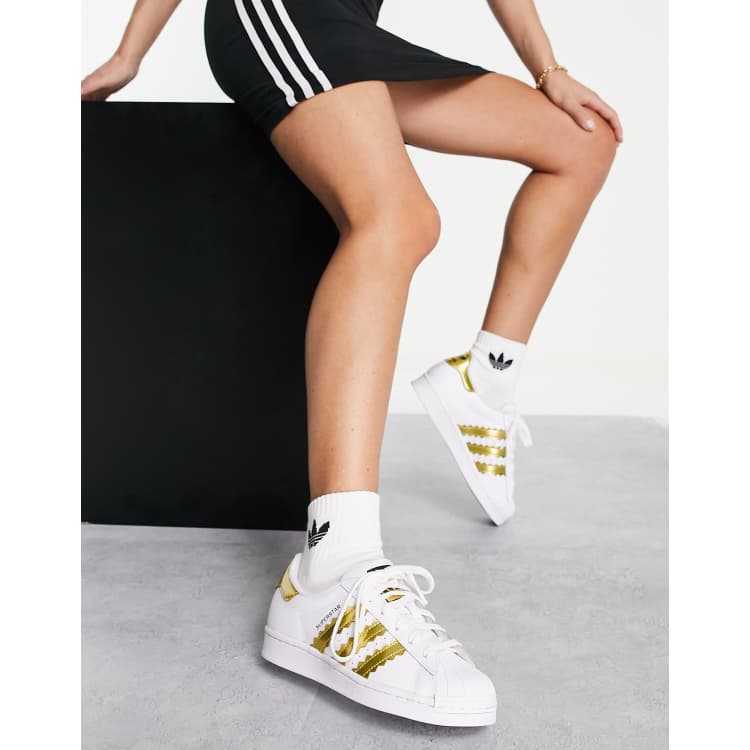 Superstar womens 2025 gold stripe