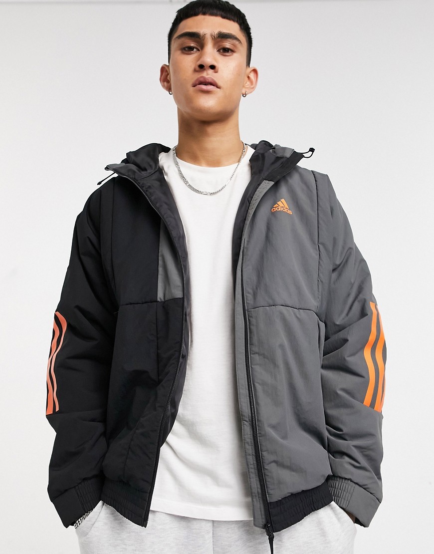 Adidas – Svart och orange jacka med huva