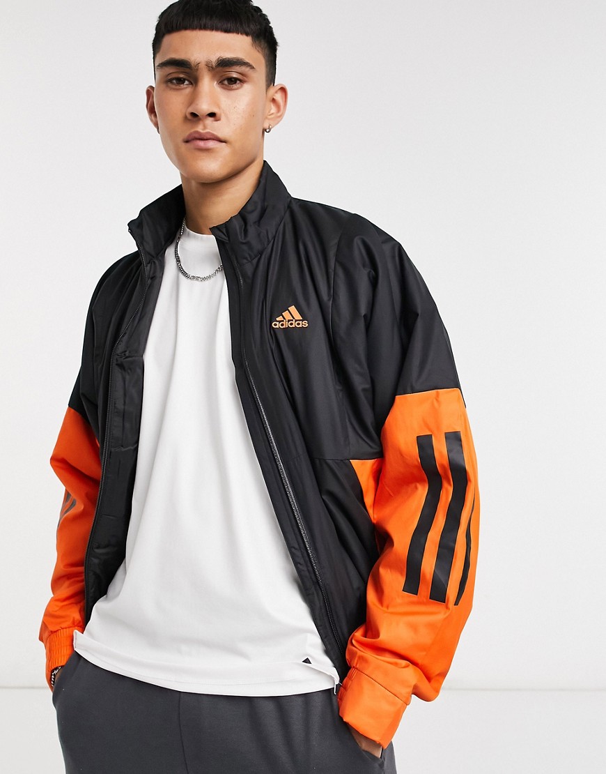 Adidas – Svart och orange tunn jacka