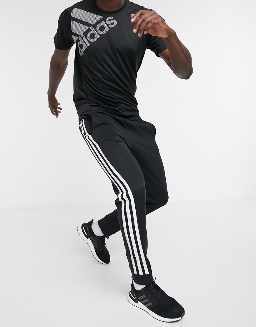 Adidas – Svarta joggers med 3 ränder