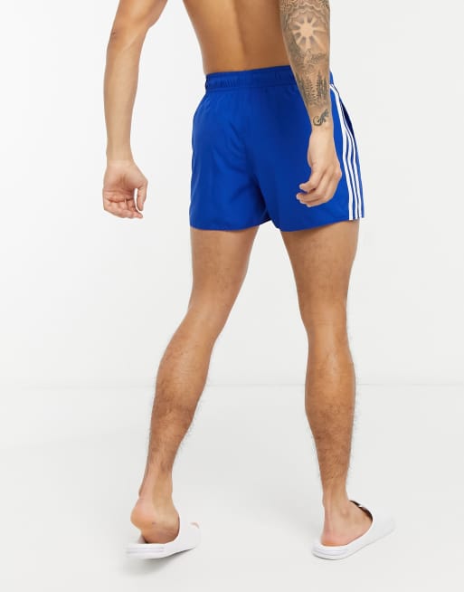 Mirar furtivamente Uganda Gaviota adidas Swim 3 stripe swimming trunks in blue | ASOS