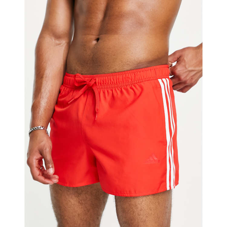 adidas Swim 3 stripe swimming trunks in red | ASOS