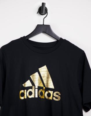 gold and black adidas shirt