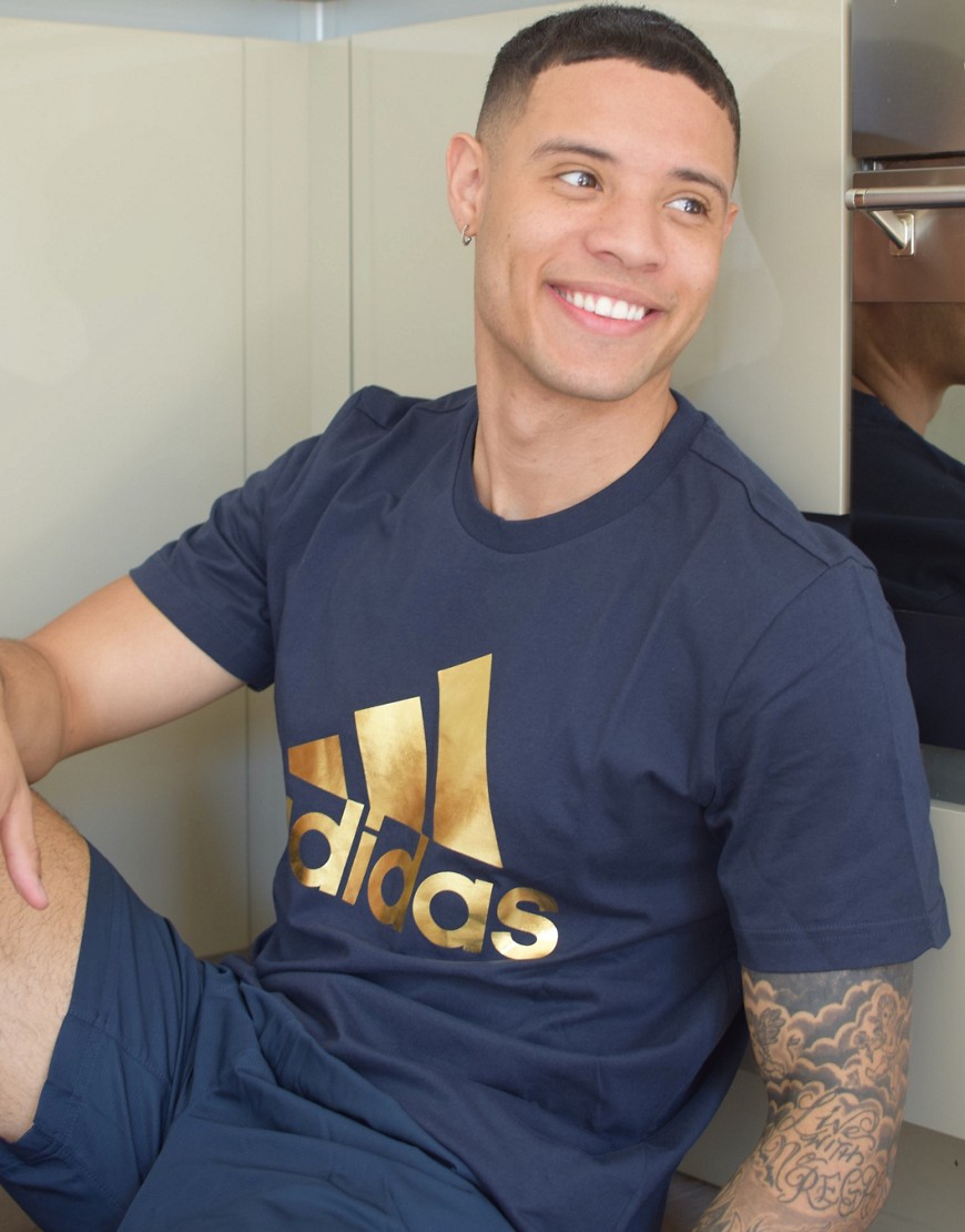Adidas t-shirt in navy with gold logo
